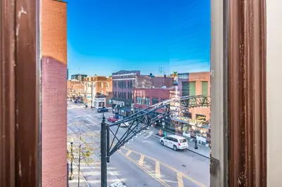 a view of a city street from a window at Walk to Convention Center, Secured Apt in Columbus in Columbus