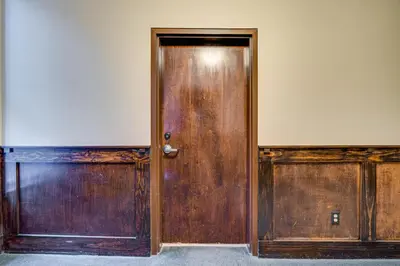 an open wooden door in an empty room at Walk to Convention Center, Secured Apt in Columbus in Columbus