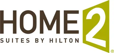 a logo for the hmc clinics by religion at Home2 Suites By Hilton Lima in Lima