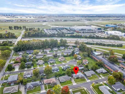 an aerial view of a suburb with a red marker at The Gahanna Getaway in Gahanna