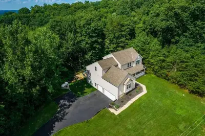 an aerial view of a large house in the woods at Weekend Retreat Hot Tub Game Room Putt Putt in Lancaster