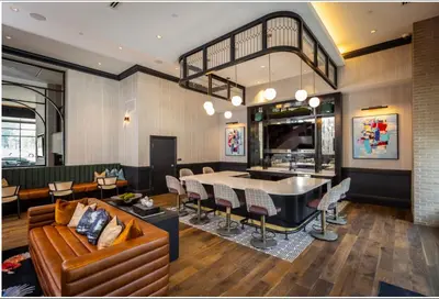 a living room with a couch and a table at Cozy 6BR 6BA combined Apartments Near Downtown Cincinnati in Cincinnati