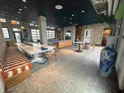 a room with a ping pong table and a vase at Brand new 4BR 3BA Combined apartments with city views in Cleveland