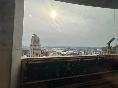 a view of a city from a window at Brand new 4BR 3BA Combined apartments with city views in Cleveland