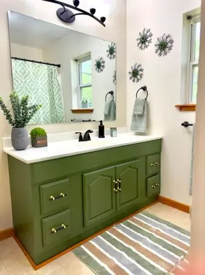 a bathroom with a green sink and a mirror at Adventure Hub Biking Hiking Hunting Paddle in Athens