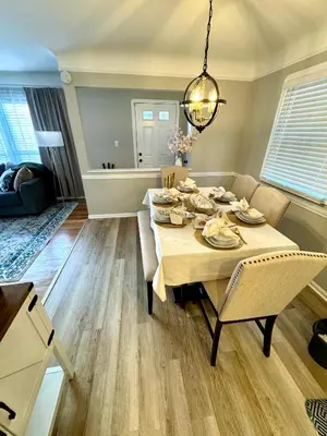 a dining room with a table and chairs at Parma Ranch with Hot Tub and Game and Media Room in Parma