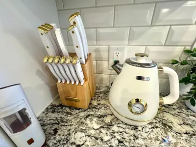 a kitchen counter with a blender and a knife block at Parma Ranch with Hot Tub and Game and Media Room in Parma