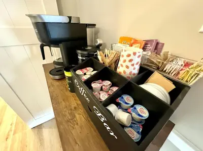 a black box filled with pastries and a coffee maker at Parma Ranch with Hot Tub and Game and Media Room in Parma