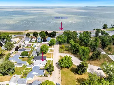 an aerial view of a park with houses and the ocean at Lake Erie Beach Hutch in Port Clinton