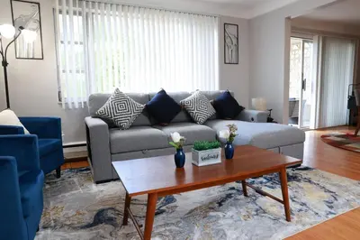 a living room with a couch and a coffee table at 30day Conveniently Located in a Quiet Suburb in Cincinnati