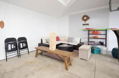 a living room with a couch and a table at Papa & Gigi's Lake Front Home in Port Clinton