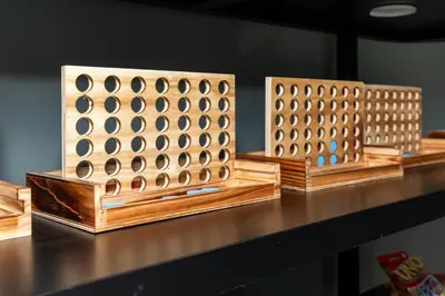 a group of wooden dominoes on a table at Family Duplex Suite in Downtown Sandusky Sleeps 12! in Sandusky
