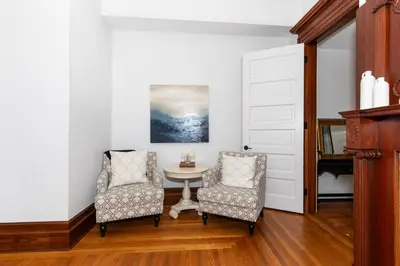 a dining room with two chairs and a table at Boutique Style Condo Near Downtown Waterfront in Sandusky