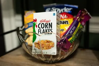a bowl of cereal and other snacks on a table at Fauver Suite B in Dayton