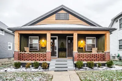 a house with a front porch with at Fauver Suite B in Dayton