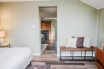a living room with a couch and a chair at Tiny Home for a King in Dayton