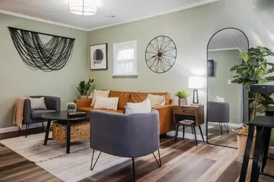 a living room with a couch and a table at Tiny Home for a King in Dayton