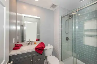 a bathroom with a toilet and a glass shower at Peaceful Dove in Tylersville