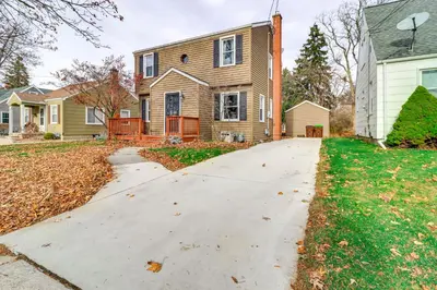 a driveway in front of a house at Walk to Adrian College Family Home in Michigan in Adrian