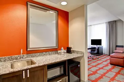 a bathroom with a sink in a hotel room at Hampton Inn and Suites Cincinnati - Downtown in Cincinnati