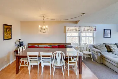 a dining room and living room with a table and chairs at Hike and Picnic at Group Getaway in Rosedale! in Rosedale