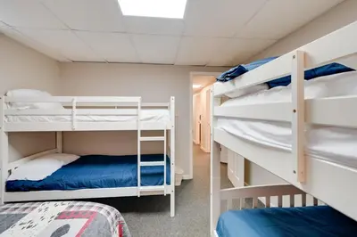 a bunk room with two bunk beds in it at Hike and Picnic at Group Getaway in Rosedale! in Rosedale