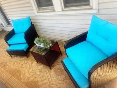 two blue chairs and a table on a porch at Walkable to Everywhere in Little Italy- Near CWRU and Cleveland Clinic Main Campus in Cleveland