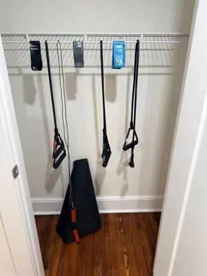 a group of utensils hanging on a wall at Beautiful Home Near Downtown & Cultural Gardens! in Cleveland