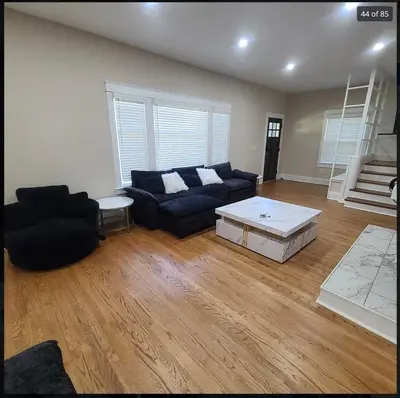 a living room with a couch and a coffee table at Beautiful Home Near Downtown & Cultural Gardens! in Cleveland