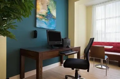 an office with a desk with a computer on it at Days Inn & Suites by Wyndham Caldwell in Caldwell