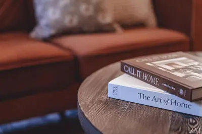 two books sitting on top of a table at Sunset Cottage Hocking Hills in Rockbridge