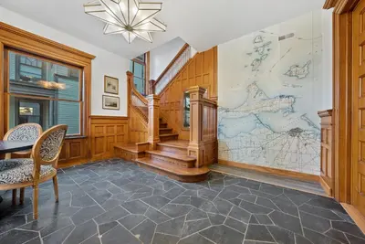 a room with a large map on the wall at Luxury Boutique Downtown Private Unit in Sandusky