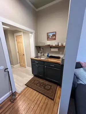 a kitchen with a sink and a counter top at Davenport House in Springfield in Springfield
