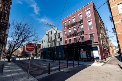 a street with buildings and a do not enter sign at Modern Condo in the heart of Over-The-Rhine in Cincinnati