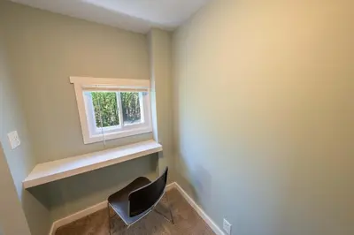 a room with a chair and a window at Oberlin Getaway in Oberlin