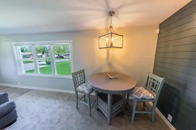 a dining room with a table and two chairs at Oberlin Getaway in Oberlin