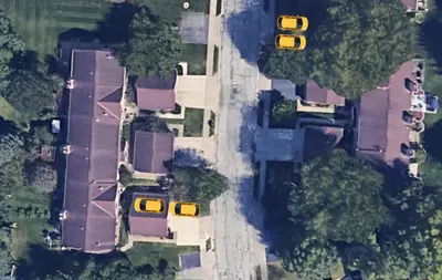 an overhead view of a street with yellow cars at North Columbus Townhouse - Central, Updated, Fireplace in Columbus