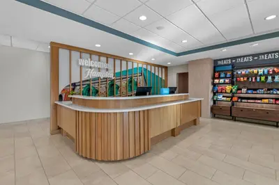 a lobby of a store with a counter in a store at Hampton Inn Mt. Vernon Oh in Academia