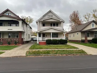 a group of houses on the side of a street at Great Room near Cleveland airport in Cleveland