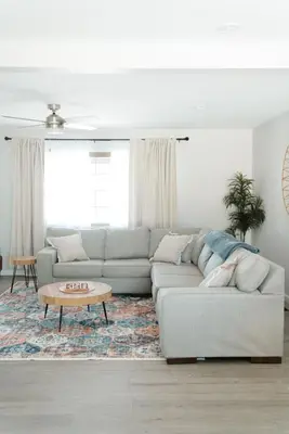 a living room with a couch and a coffee table at Mid Ohio Comfort 10 Minutes From Snow Trails in Lexington
