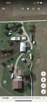an aerial view of a farm with a winding road at Scippo Creek Farm in Circleville