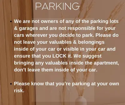 a sign that reads parking we are not owners of any of the parking lots at OTR's Hidden Gem in Cincinnati