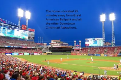 a crowd of people watching a baseball game at Dimmick Cozy Retreat 3 Bed 1 Bath - Sleeps 6 in Gano