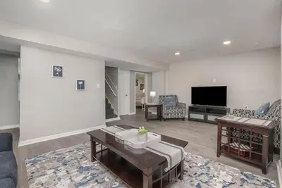 a living room with a couch and a tv at Ashwood Arbor 6 bed 3 bath sleeps 13 in Olde West Chester