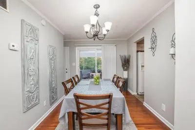 a dining room with a table and chairs at Ashwood Arbor 6 bed 3 bath sleeps 13 in Olde West Chester