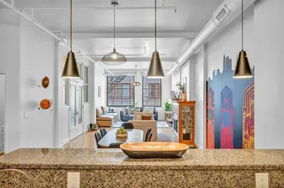 a kitchen with a bowl on a counter in a room at Lofts on E 4th, WALK TO CAVS, Sleeps 6 in Cleveland