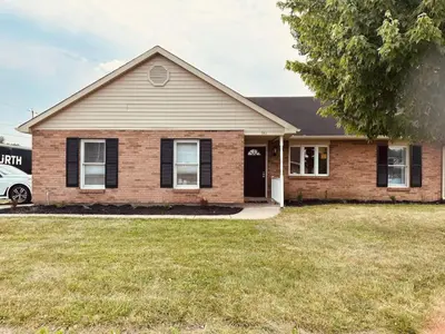 a house with a car parked in front of it at Tranquility in Trenton -Sleeps 9 in Trenton