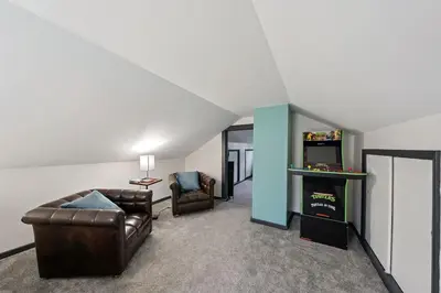 a living room with two chairs and a couch at Welcome to the Treasure house! in Westlake