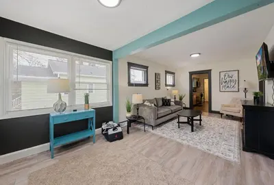 a living room with a couch and a tv at Welcome to the Treasure house! in Westlake