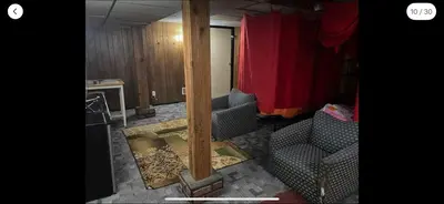 a room with two chairs and a table in a room at Tarawa drive in Cincinnati